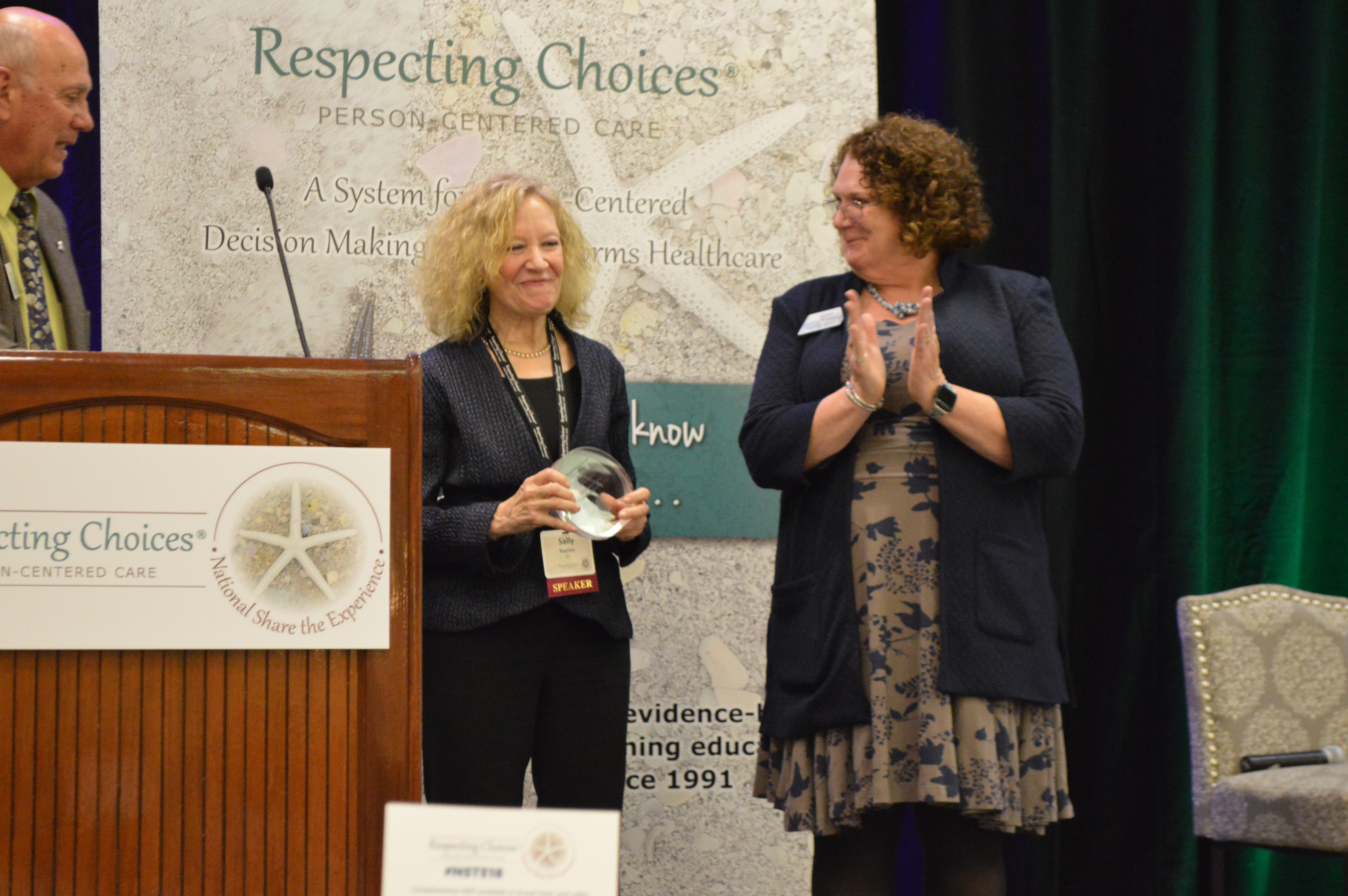 Excellence and Innovation in Community Engagement (Honorable Mention) - Recipient: “What Matters: Caring Conversations about End of Life” | Pictured L-R: Bud Hammes (RC), Sally Kaplan,  Pat Tadel (RC)
